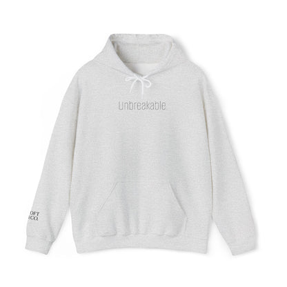 'Unbreakable.' Light Embroidered Minimalist Hoodie — Subtle Text Chest & Sleeve