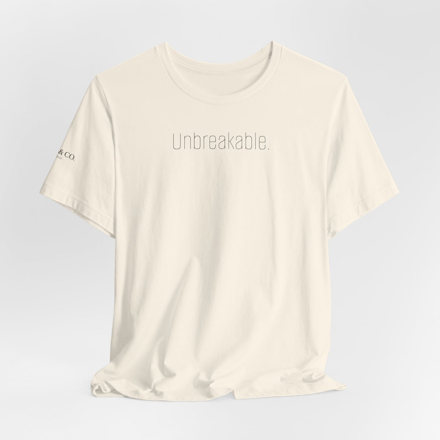 Unbreakable T-Shirt — Bold 'Unbreakable.' Graphic Tee for Resilience & Motivation