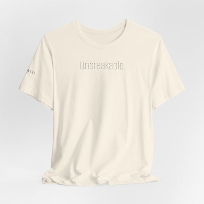 Unbreakable T-Shirt — Bold 'Unbreakable.' Graphic Tee for Resilience & Motivation